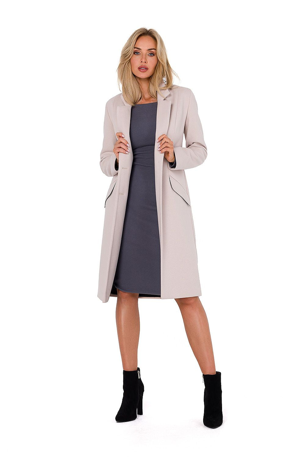 Timeless Women's Fleece Coat by Moe, highlighting elegant cuts and fine craftsmanship made in Poland.