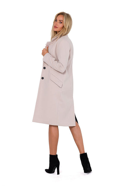 Elegant women's classic fleece coat with padded collar and asymmetrical pockets, designed by Moe in Poland, offering a luxurious blend of style and comfort.