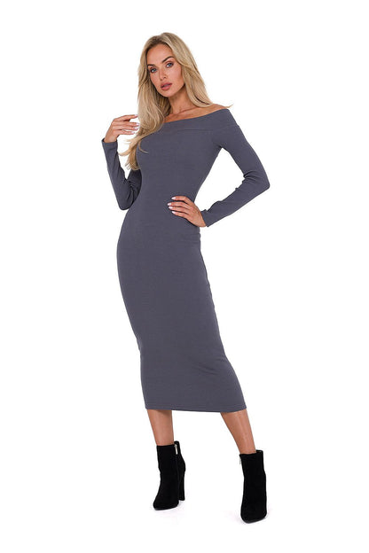 Elegant long-sleeved knit dress by Moe displayed on a model, illustrating its versatility from casual to formal settings.