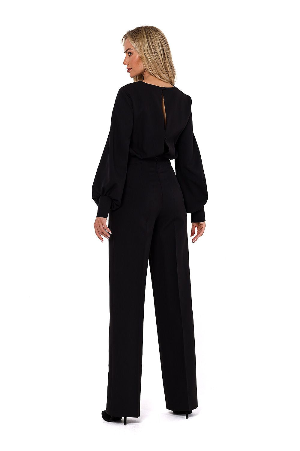 Back detail of Moe's Women's Jumpsuit highlighting the covered zipper and button fastening, embodying sophistication and style.