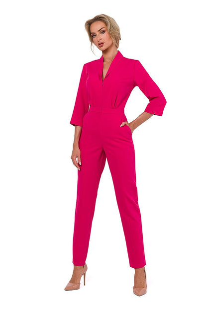 Elegant 3/4 sleeve jumpsuit by Moe featuring a lined collar and covered zipper, showcasing luxury and sophistication.