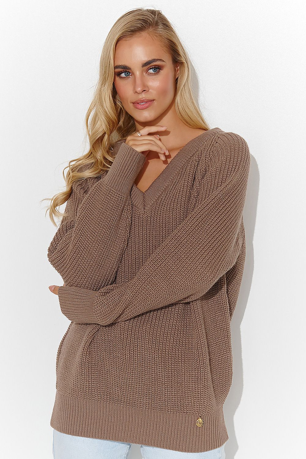 Full view of a chic Makadamia women's jumper in a comfortable loose fit, elegantly designed with a unique heart neckline and gold tinsel accents.