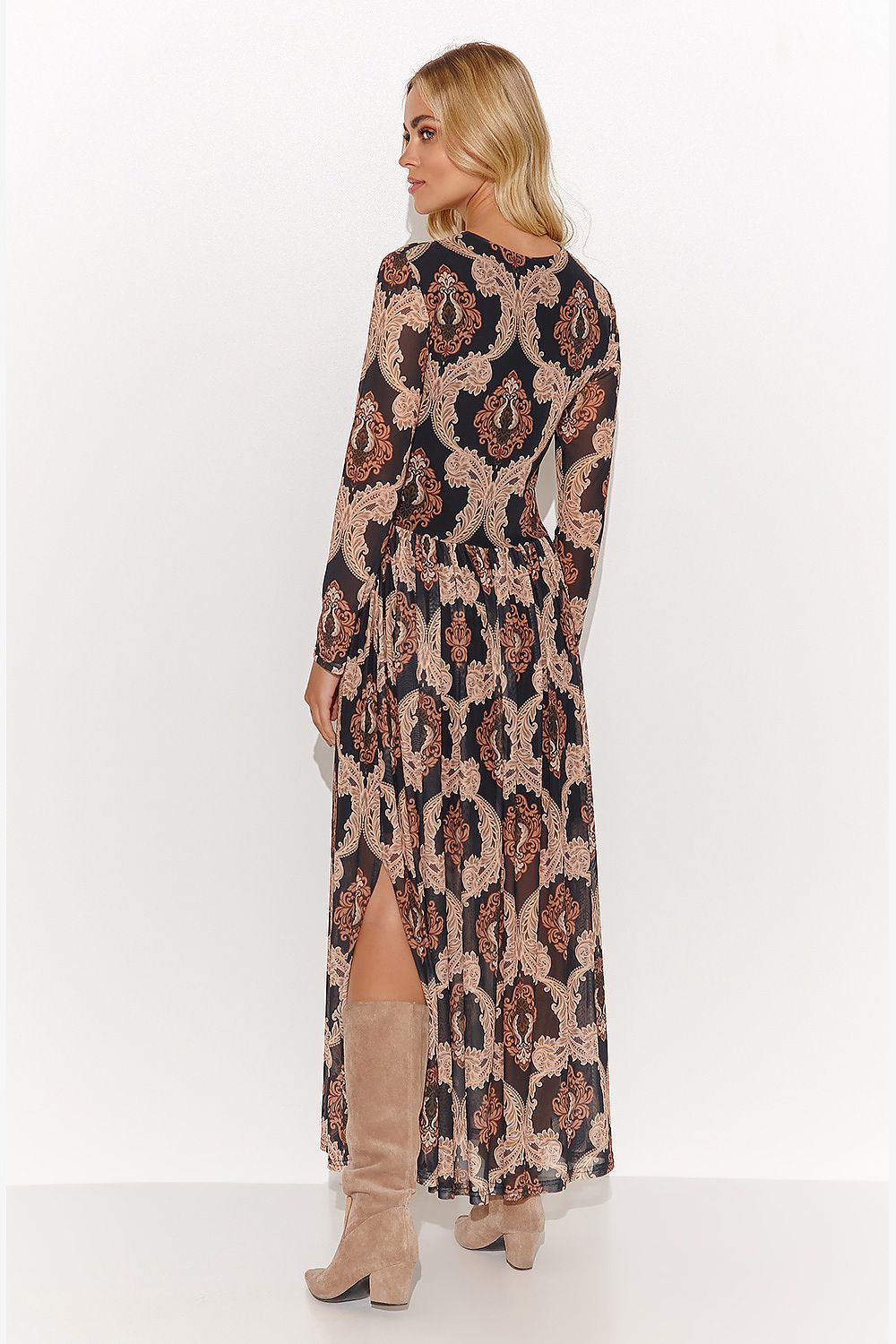 Makadamia designer long dress showcasing a graceful silhouette, highlighting the triangle neckline and versatile side slits, ideal for stylish everyday wear.