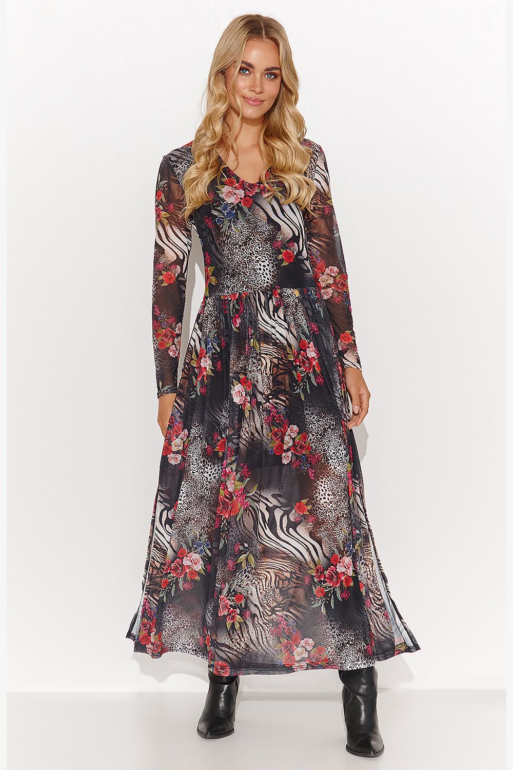 Gracefully draped Makadamia dress showcasing a semi-transparent fabric with intricate prints, ideal for refined occasions.