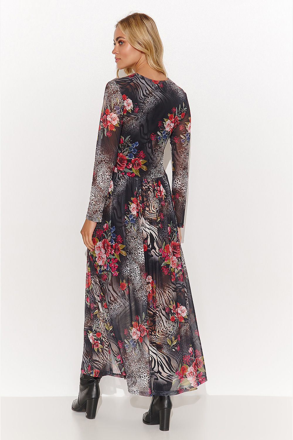 Stylish Makadamia dress detail highlighting the beautiful triangle neckline and chic side slits for a sophisticated look.