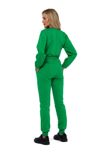 Detailed view of Moe Women's Luxury Suit featuring tailored long sleeves, flattering waist ties, and stylish side pockets, designed in Poland.