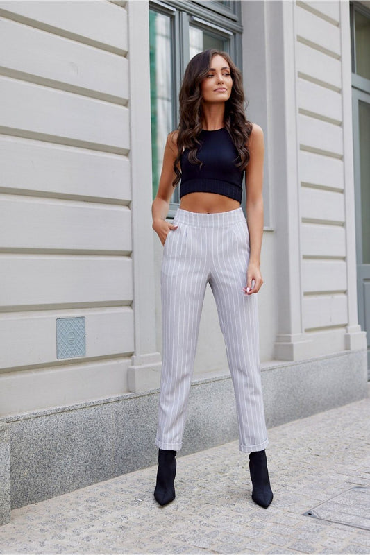 Elegant women's tapered leg trousers by Roco Fashion featuring slip pockets, perfect for stylish everyday and occasional wear.