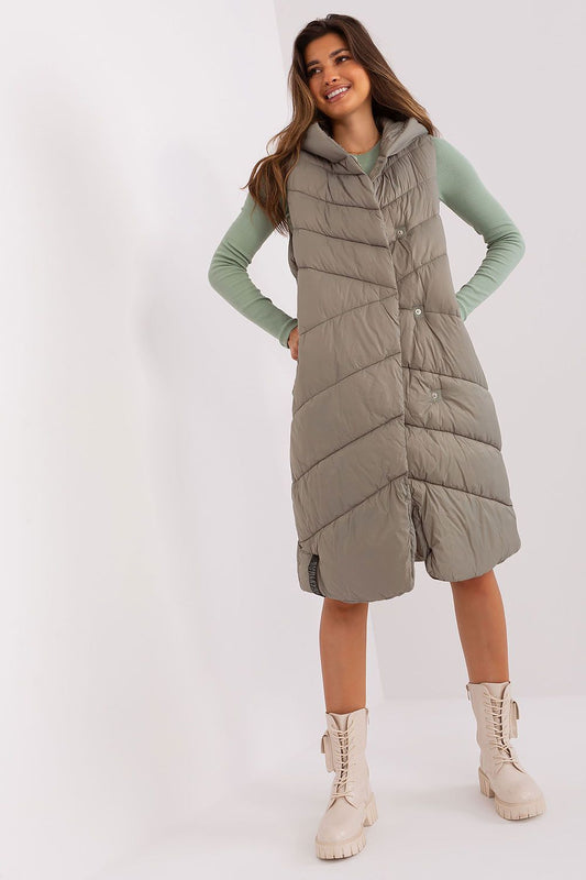 Sublevel Quilted Hooded Vest in luxurious polyamide features an insulated design, stylishly lined, equipped with practical side pockets, ideal for elegant layering in cooler weather.
