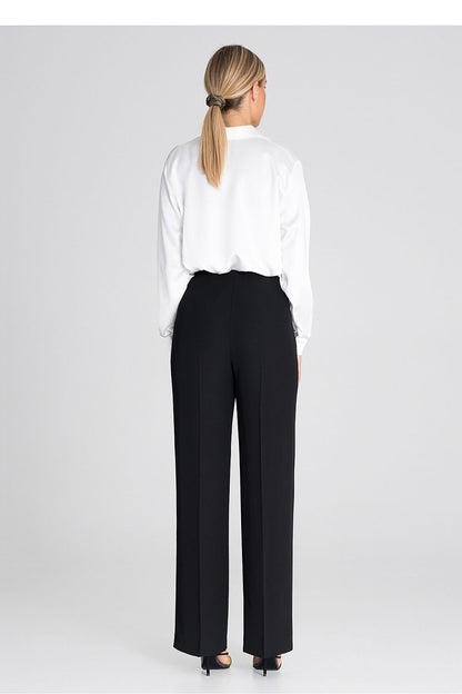 Chic Figl wide-leg trousers displayed with perfect fit, highlighting their extensive length and an effortlessly fashionable silhouette.