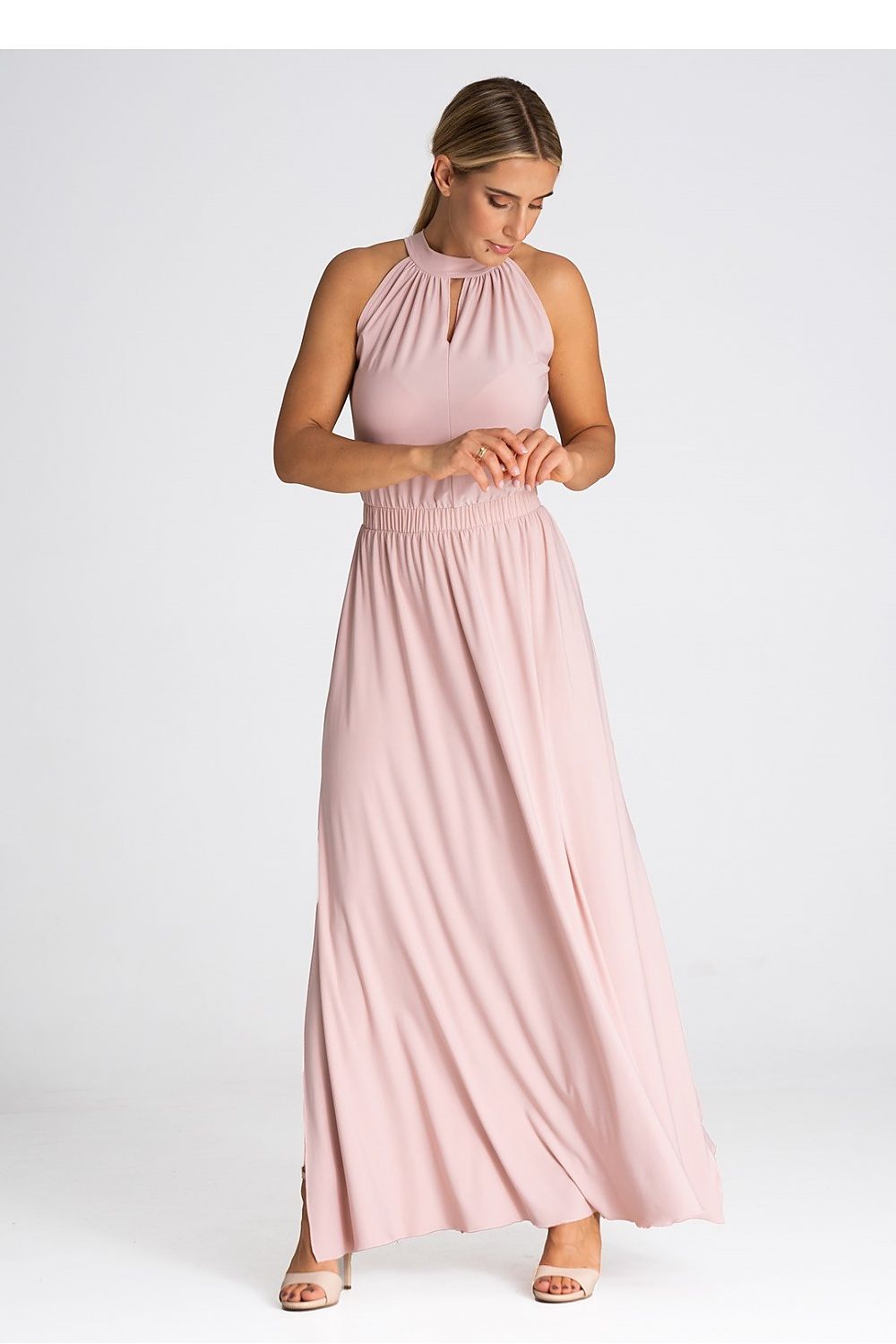 Side view of Figl sleeveless maxi dress showcasing the stylish side slits and elastic waistband.