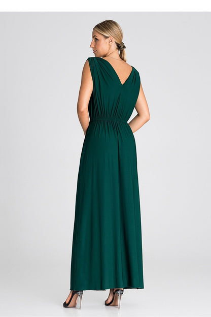 Chic Figl maxi dress highlighting an eye-catching slit and delicate ruffle details, ideal for glamourous parties and gatherings.