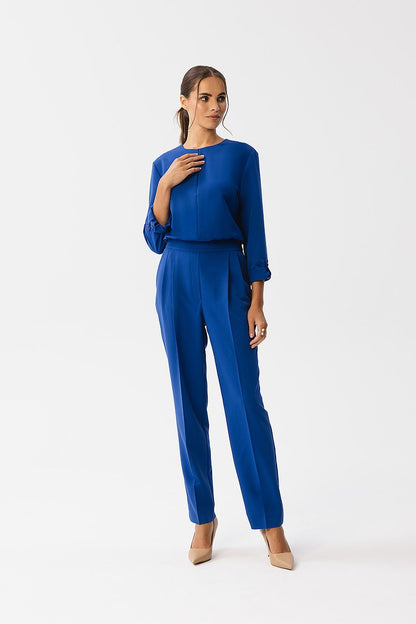 Luxurious one-piece jumpsuit by Stylove showcasing a striking slit neckline, side pockets, and refined fabric blend ideal for contemporary fashionistas.