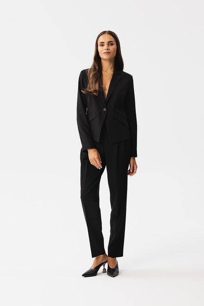 Detailed shot of the luxurious fabric used in Stylove's elegant jacket, highlighting its premium quality and texture.