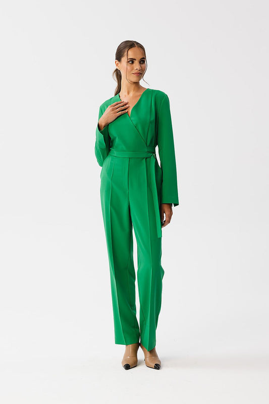 Stylove elegant jumpsuit featuring an envelope neckline and statement waist belt, designed for modern luxury, showcasing high-quality fabric and sophisticated detailing.