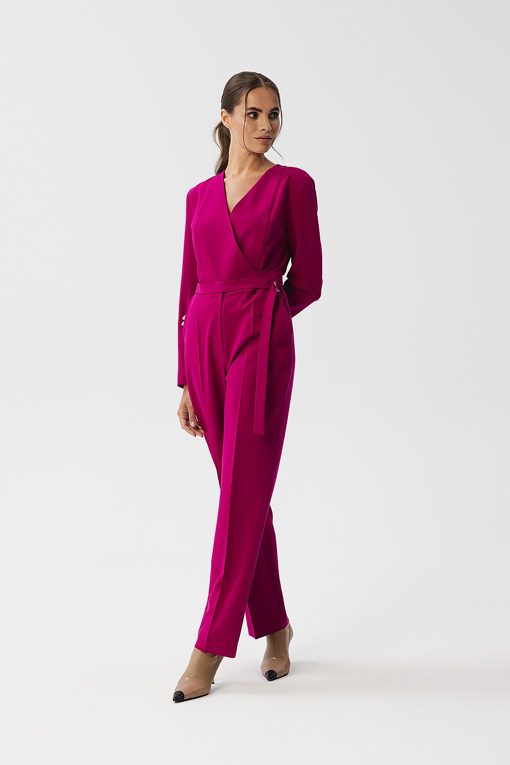 Stylove Elegant Jumpsuit showcasing an envelope neckline and statement waist belt, perfect for luxury occasions.