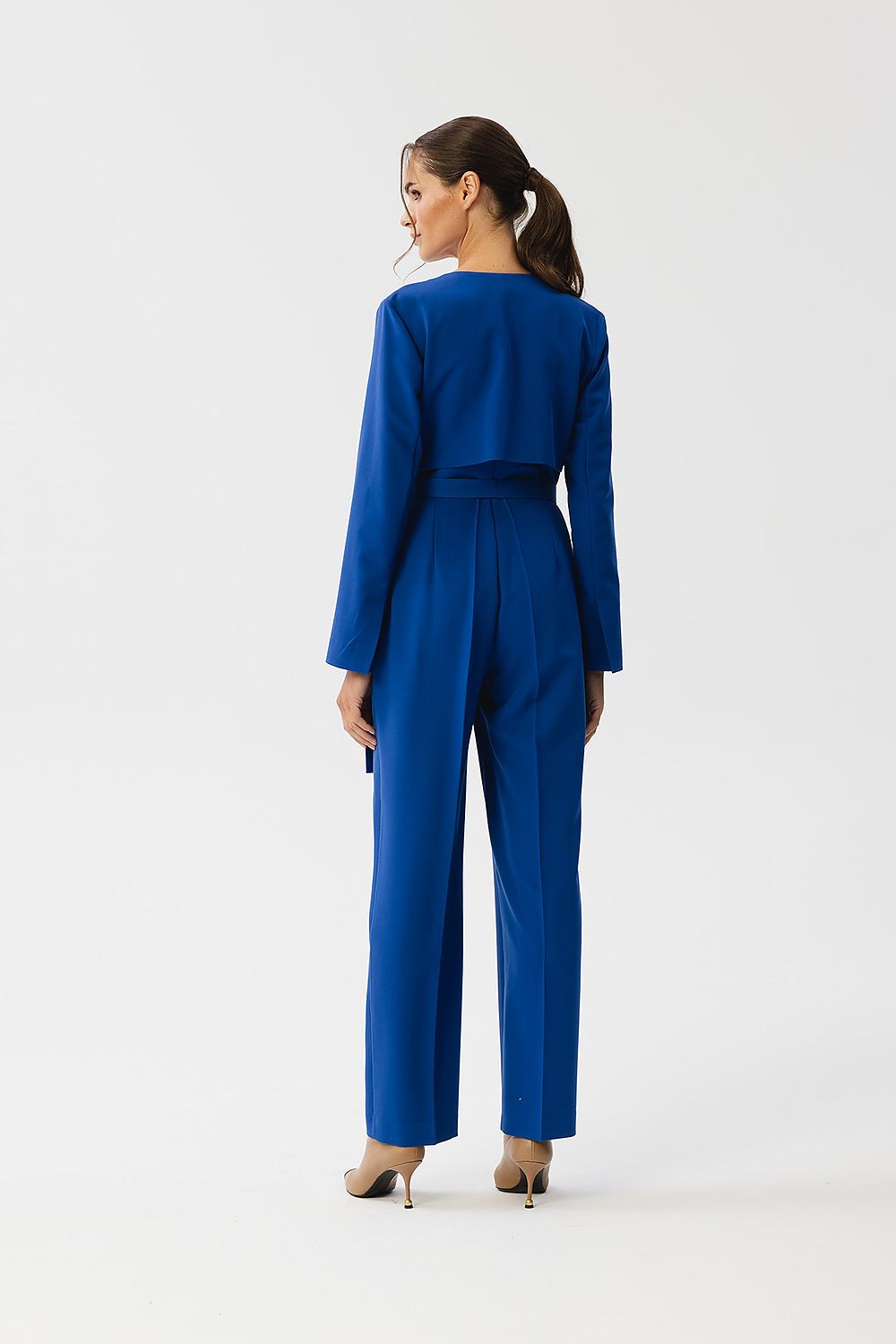 Stylove Elegant Jumpsuit featuring an envelope neckline and a statement waist belt, crafted from high-quality fabric for a luxurious look, designed for modern elegance.