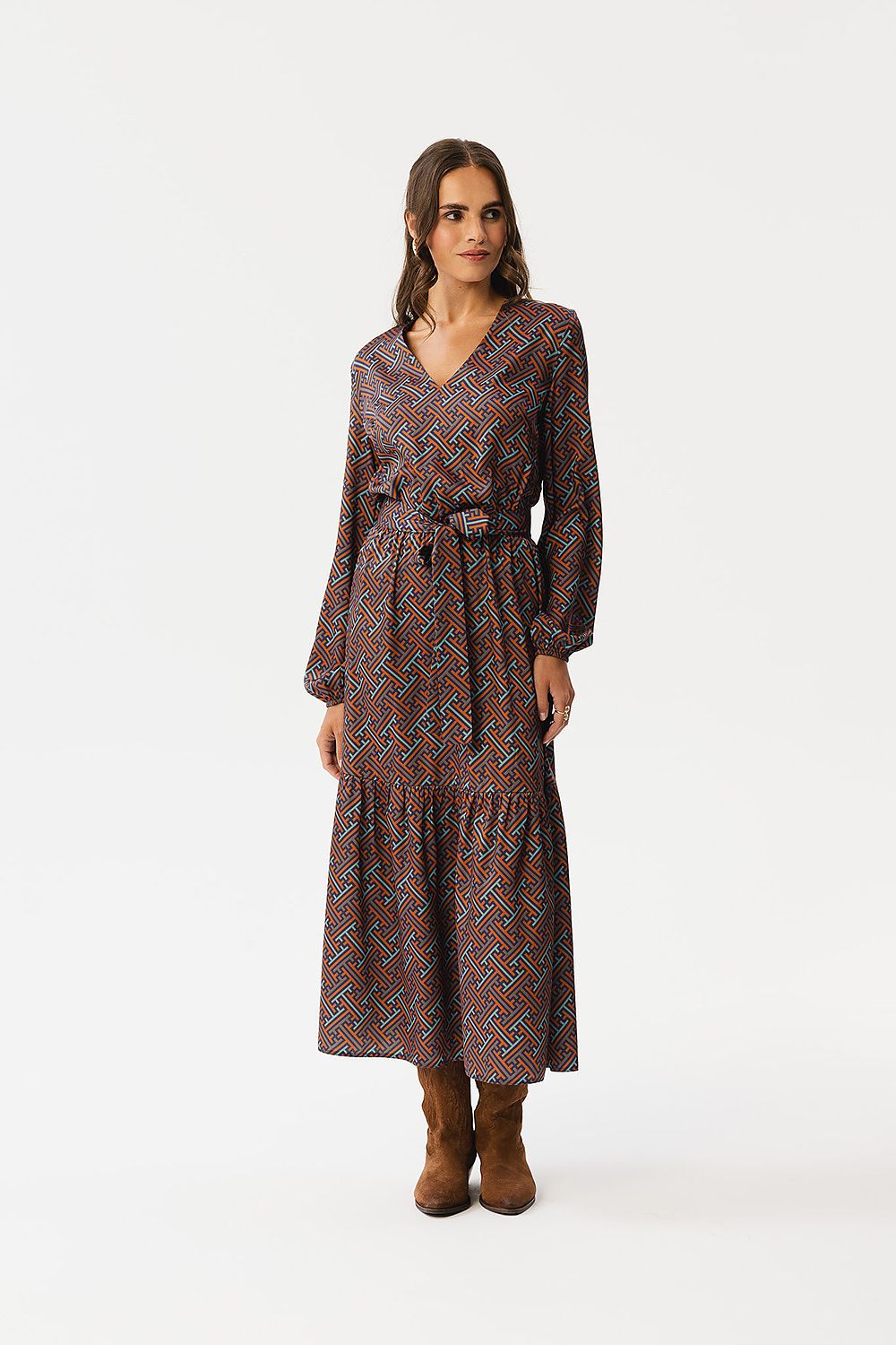 Stylove Maxi Dress featuring a chic geometric pattern, elegant V-neckline, and luxurious ruffle hem, expertly crafted in Poland.