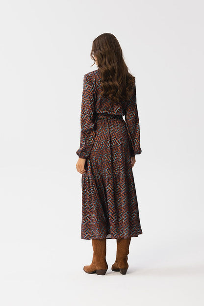 Stylove Maxi Dress with waist tie detail and stylish long sleeves, showcasing a sophisticated design for elegant occasions.