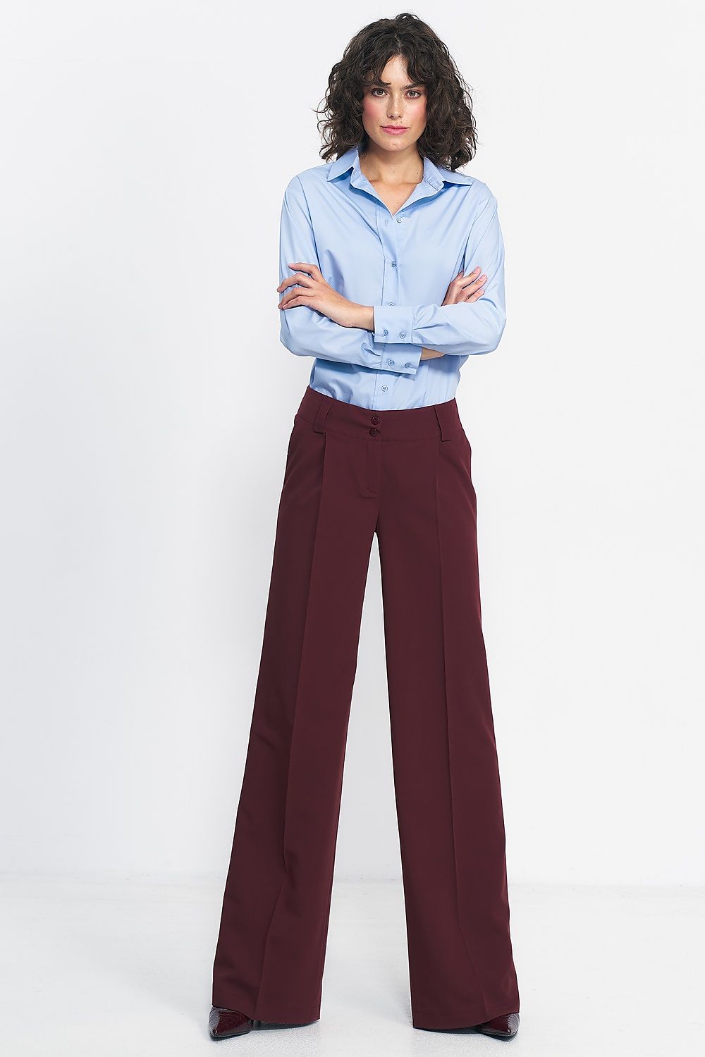 Chic elegant wide leg trousers by Nife, crafted from premium materials for a perfect fit and lengthening effect.