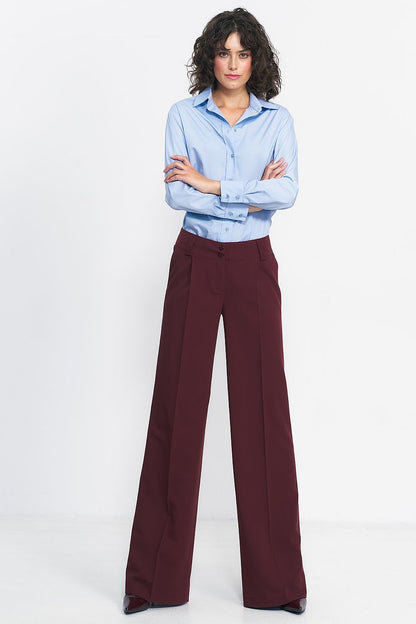 Chic elegant wide leg trousers by Nife, crafted from premium materials for a perfect fit and lengthening effect.