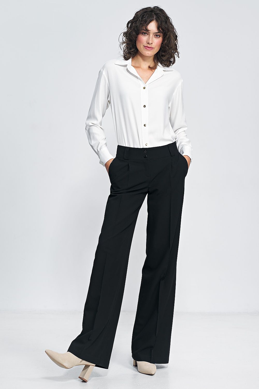 Stylish Nife wide-leg trousers, designed to enhance your silhouette with a flattering fit and elevated waist.