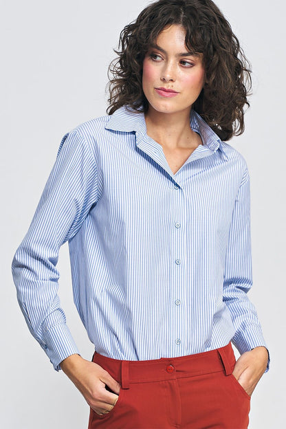 Nife luxury blouse showcased in soft office styling, highlighting the comfortable fit and elegant muted colours.