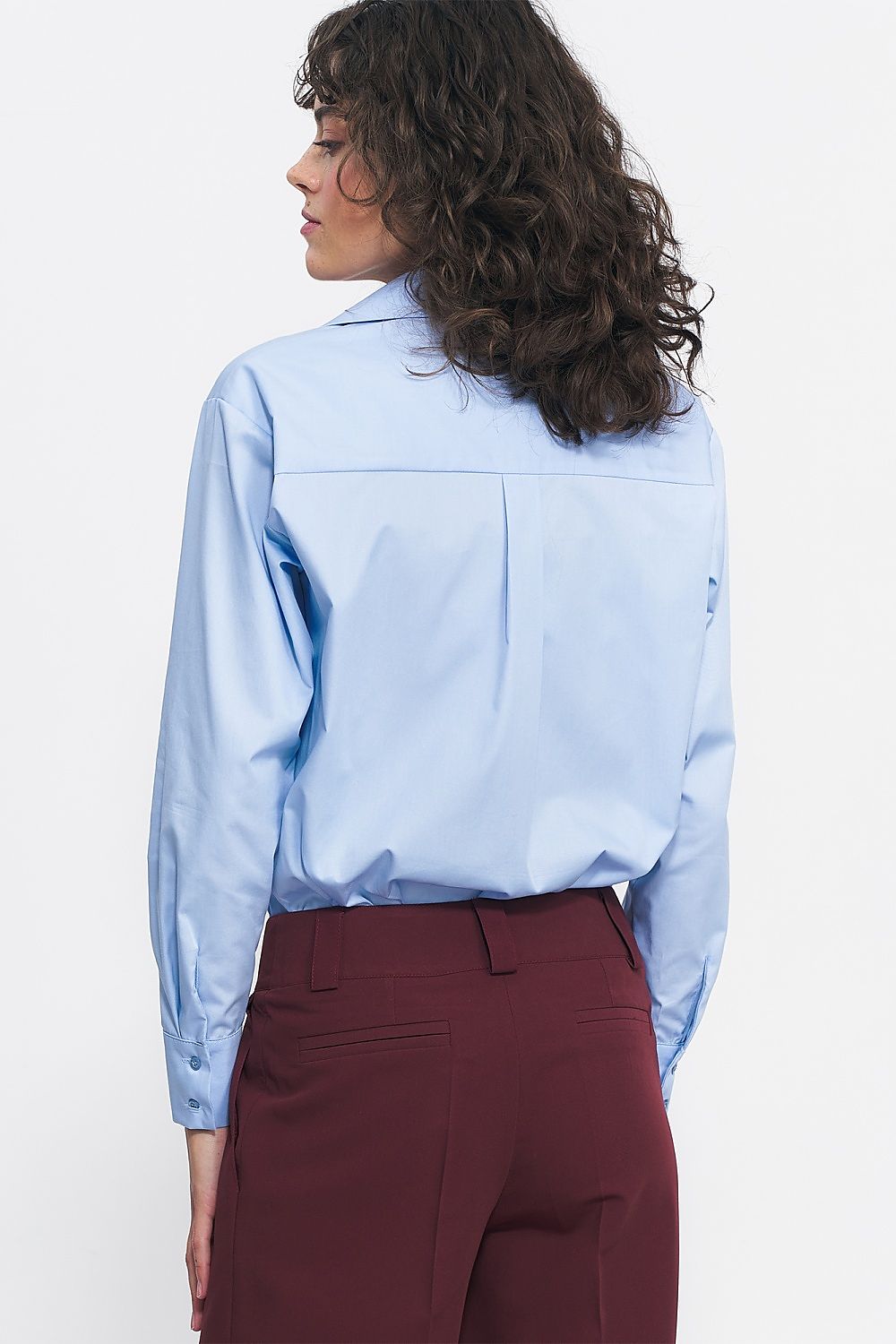 Fashionable Nife blouse in 100% viscose displayed on a mannequin, exemplifying luxury and comfort with its elegant design.