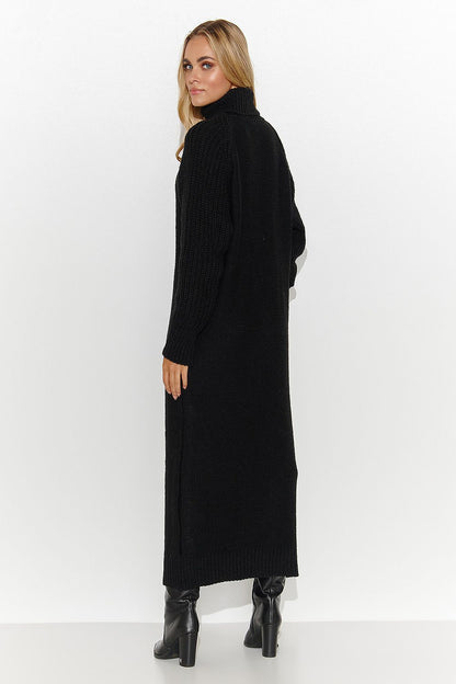 Charming colours of the Makadamia knee-length sweater dress, ideal for autumn and winter, paired with boots for a fashionable look.