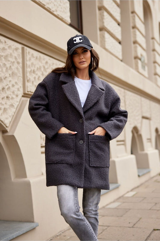 Sanchez Long Buttoned Jacket by Roco Fashion, crafted from soft sheepskin-style fabric, perfect for autumn and spring. Luxury women's coat showcasing elegant design and high-quality finish.