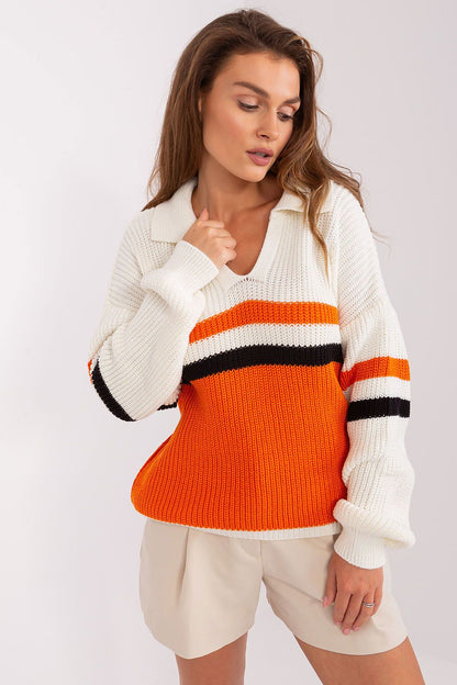 Badu's chic casual sweater with striking stripes and a heart neckline, designed for versatile luxury looks suitable for any occasion.