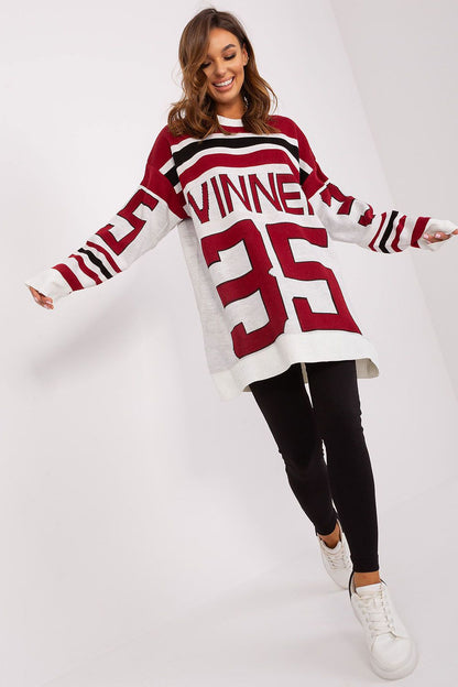 Sophisticated Badu Long Sleeve Jumper crafted from soft acrylic material, highlighted by a unique print, ideal for fashionable layering in cooler seasons.