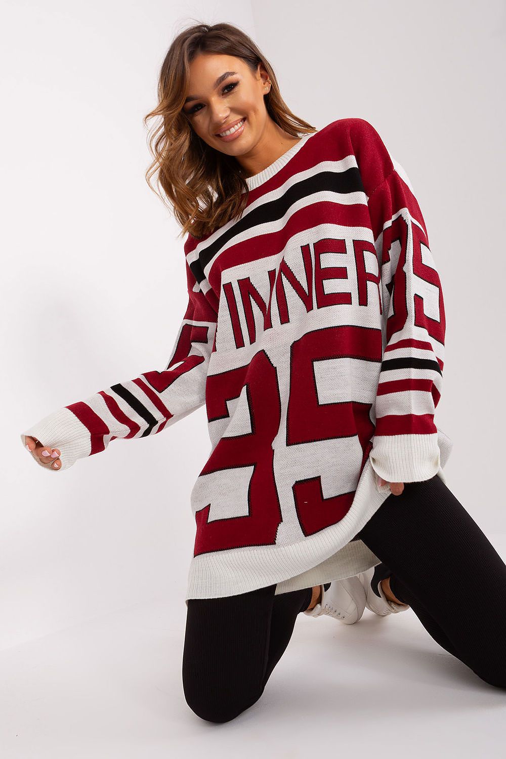 Stylish Badu Extended Cut Jumper, combining warmth and comfort with a standout print, perfect for adding a touch of luxury to everyday wear.