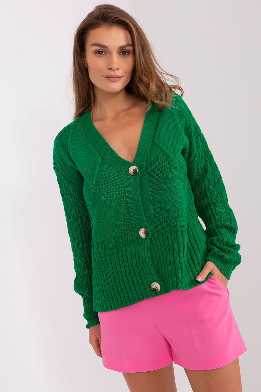Elegant Badu acrylic cardigan featuring a heart neckline and stylish button closure, perfect for upscale casual wear.