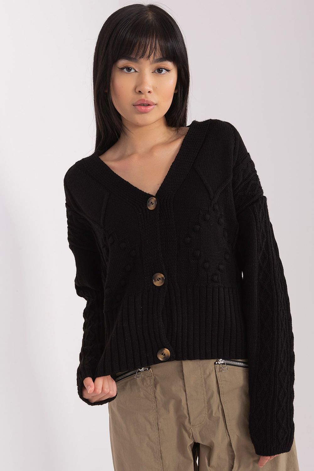 Sophisticated Badu acrylic cardigan with a heart neckline and elegant button closure, perfect for pairing with jeans or skirts.