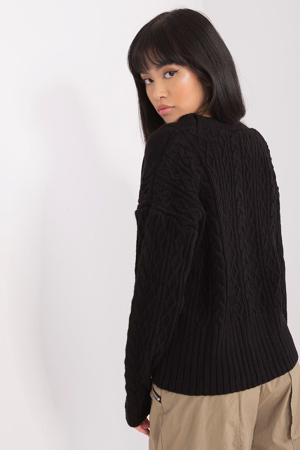 Chic and cosy Badu acrylic casual sweater featuring a distinctive heart neckline, perfect for layering in stylish outfits.