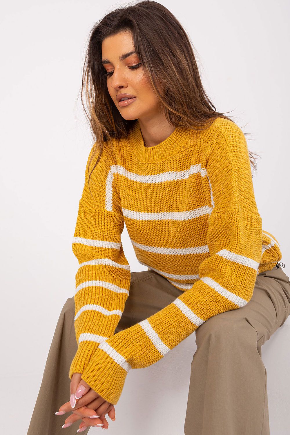 Chic long sleeve acrylic wool sweater by Badu, combining comfort and elegance with its sophisticated stripe pattern.