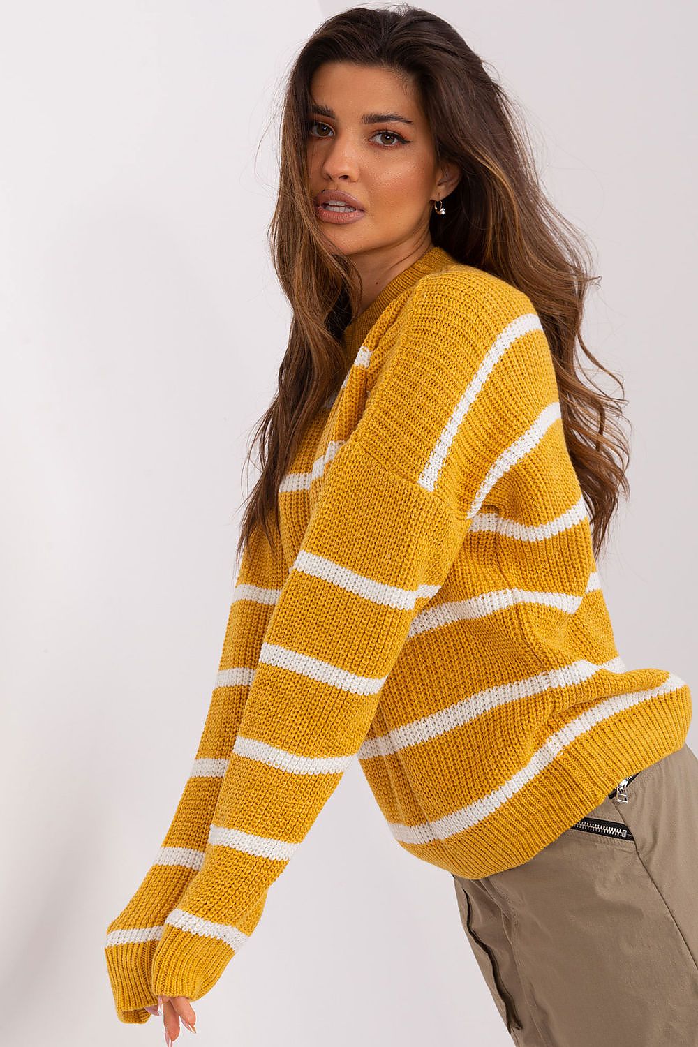 Elegant Badu acrylic wool jumper sweater in a chic stripe design, showcasing long sleeves and a comfortable round neckline, ideal for versatile fashion.
