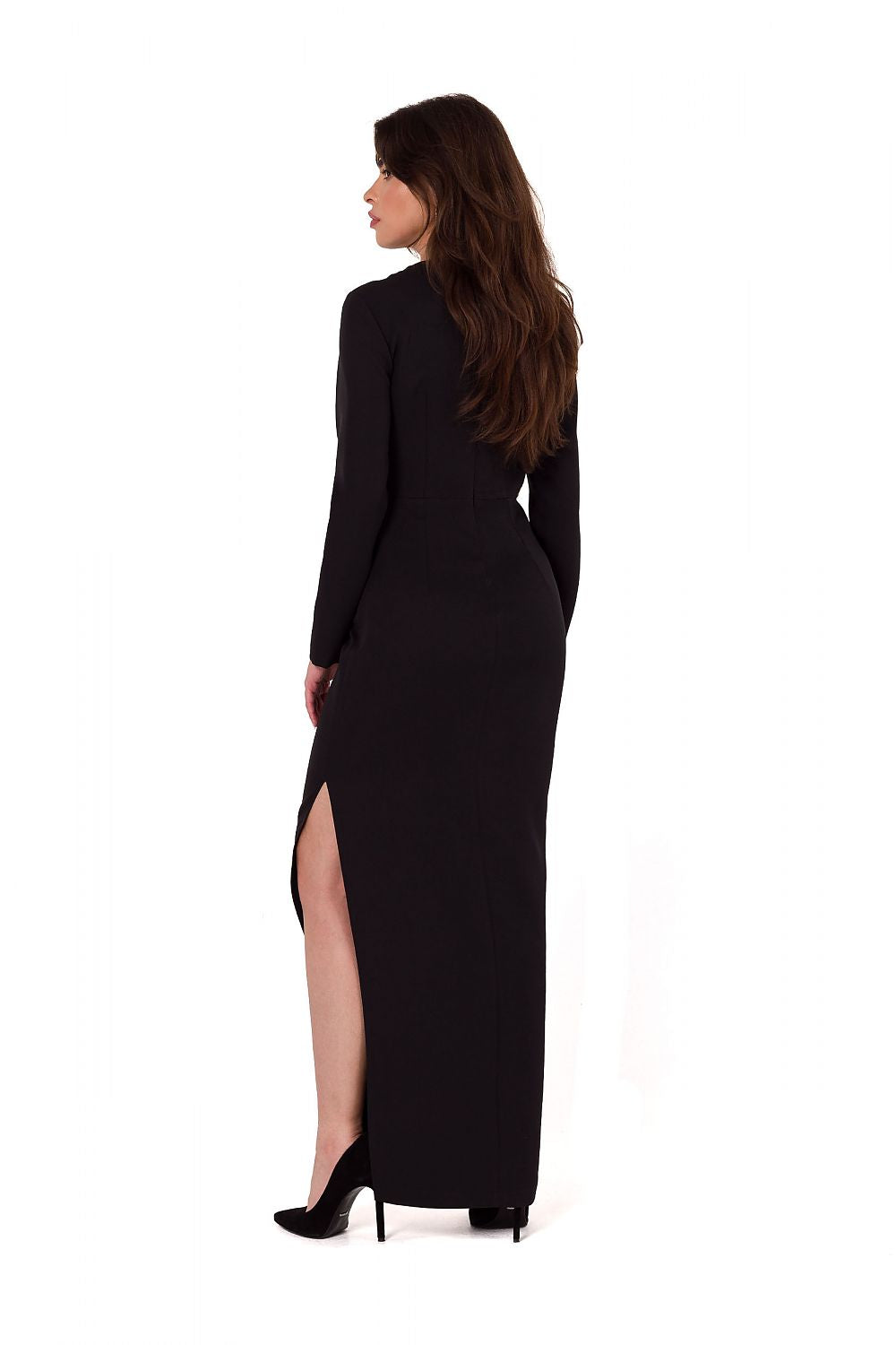 Back view of Makover's asymmetrical maxi dress with a subtle covered zipper, capturing its light and airy structure.