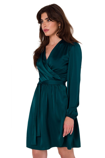 Elegant satin evening dress by Makover featuring envelope cut and long sleeves, perfect for chic occasions.