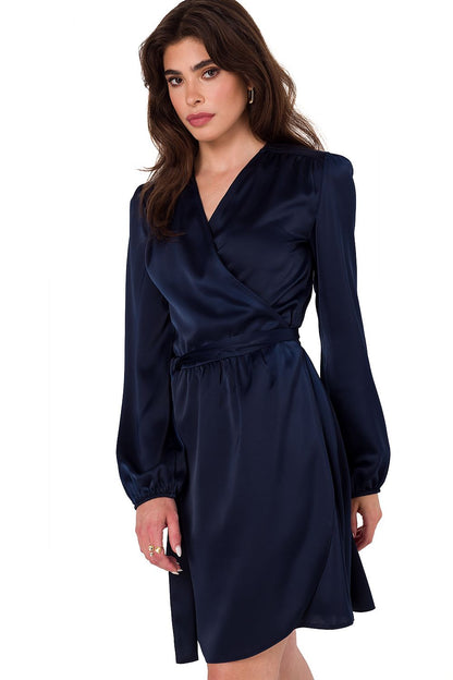 Elegant satin evening dress by Makover featuring a feminine envelope cut and long sleeves, perfect for luxurious occasions.