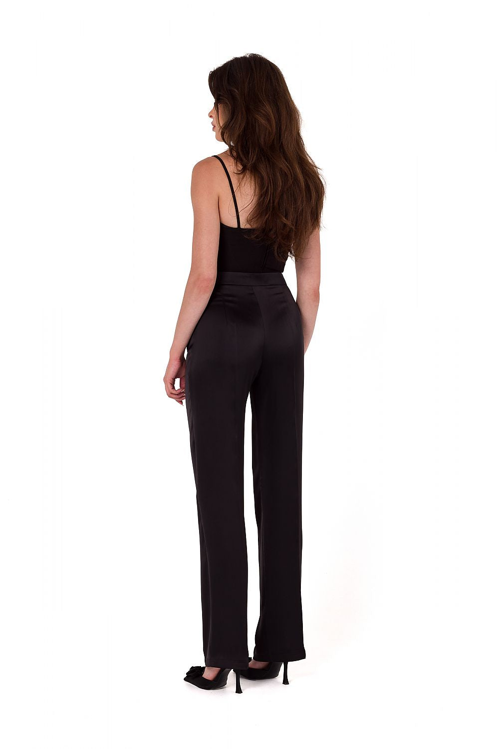 Model wearing elegant satin trousers by Makover, demonstrating versatile styling options for formal and casual occasions.