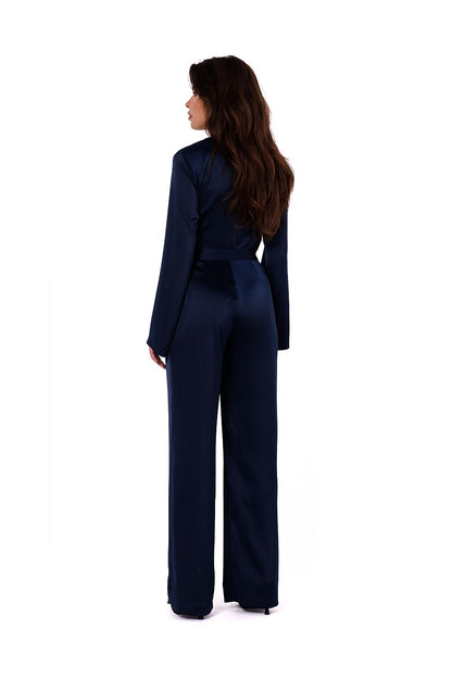 Side profile of Makover's satin jumpsuit highlighting the long wide sleeves and luxurious fabric, designed for stylish women's attire.