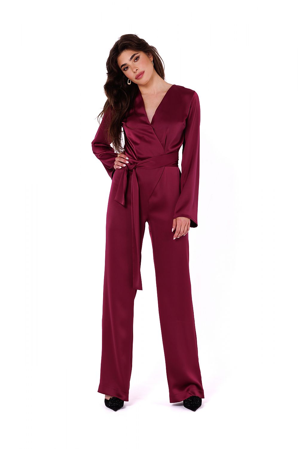 Model wearing Makover's elegant satin jumpsuit, demonstrating the chic V-neckline and tailored fit, a perfect addition to any luxury wardrobe.