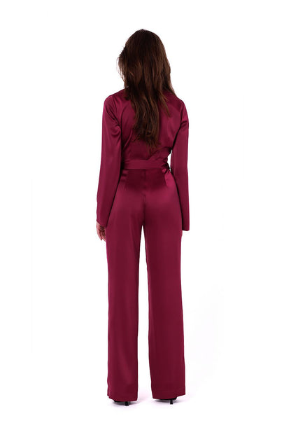 Elegant satin jumpsuit by Makover featuring a V-neckline, wide sleeves, and a tied belt, perfect for sophisticated women's fashion.
