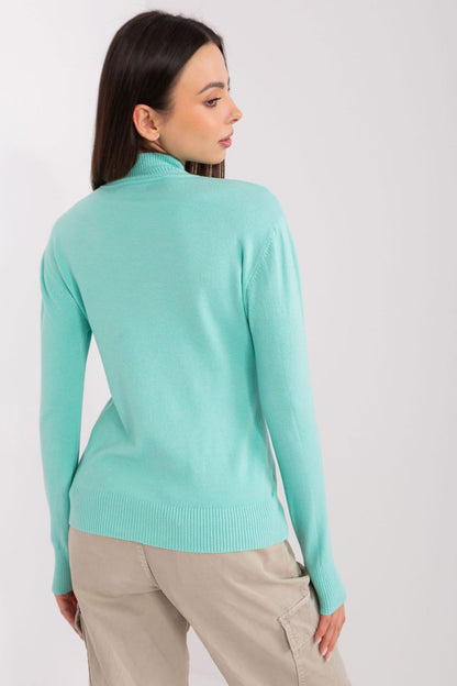 A model showcasing the versatile long sleeve wear from Factory Price, featuring an elegant turtleneck and soft viscose fabric.