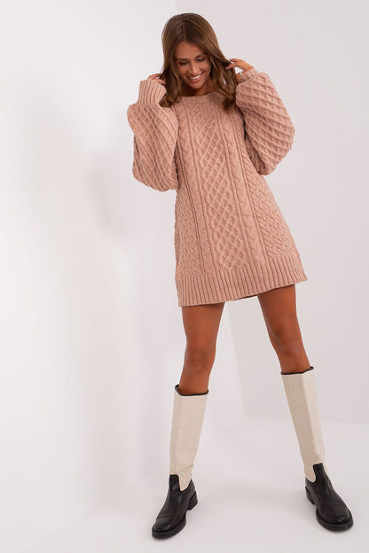 Chic long sleeve sweater dress from AT, featuring a comfortable oversized cut and cozy acrylic composition, ideal for elegant winter styling.