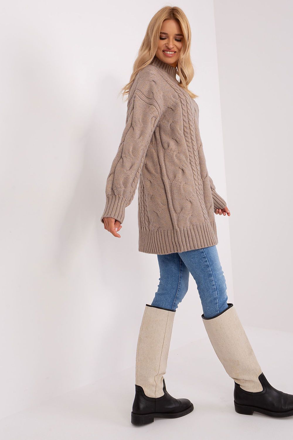 Versatile oversized long turtleneck jumper by AT, ideal for fashion-forward individuals seeking elegance and comfort.