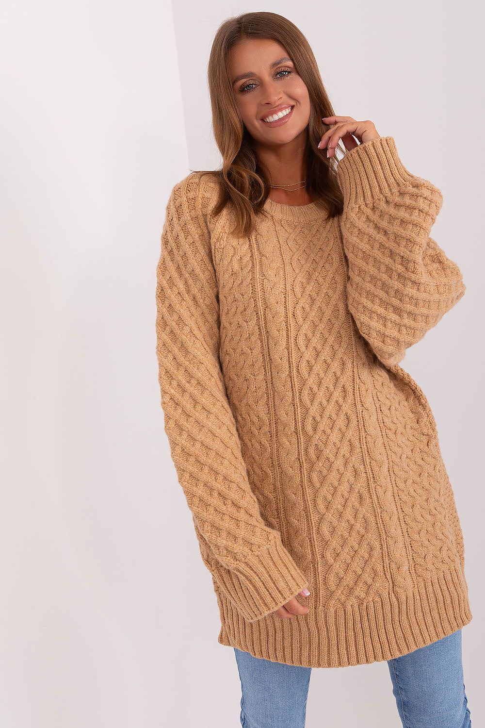 AT's oversized long sweater dress, offering a blend of warmth and style with its unique variegated fabric design, perfect for colder seasons.