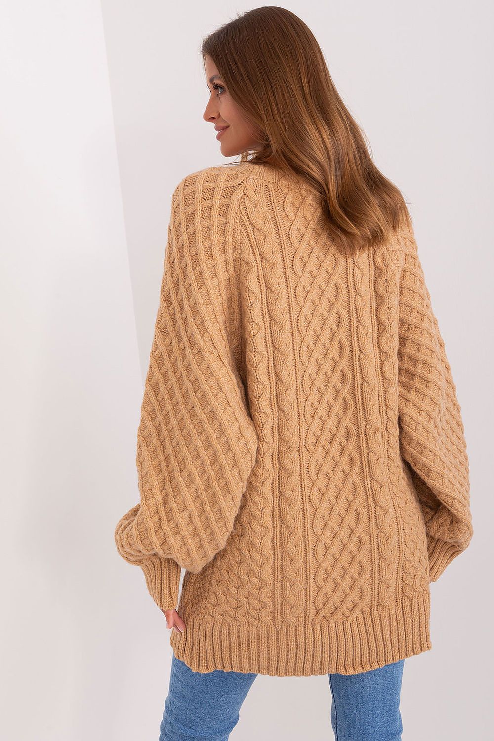 Elegant long sleeve oversized sweater dress by vendor AT, showcasing a unique variegated texture for a chic winter look.