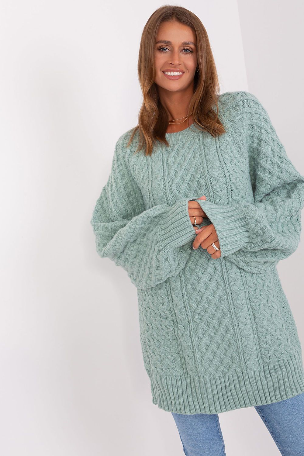 Stylish long acrylic sweater dress with loose fit and buff sleeves, an exceptional creation by AT for those who value elegance.